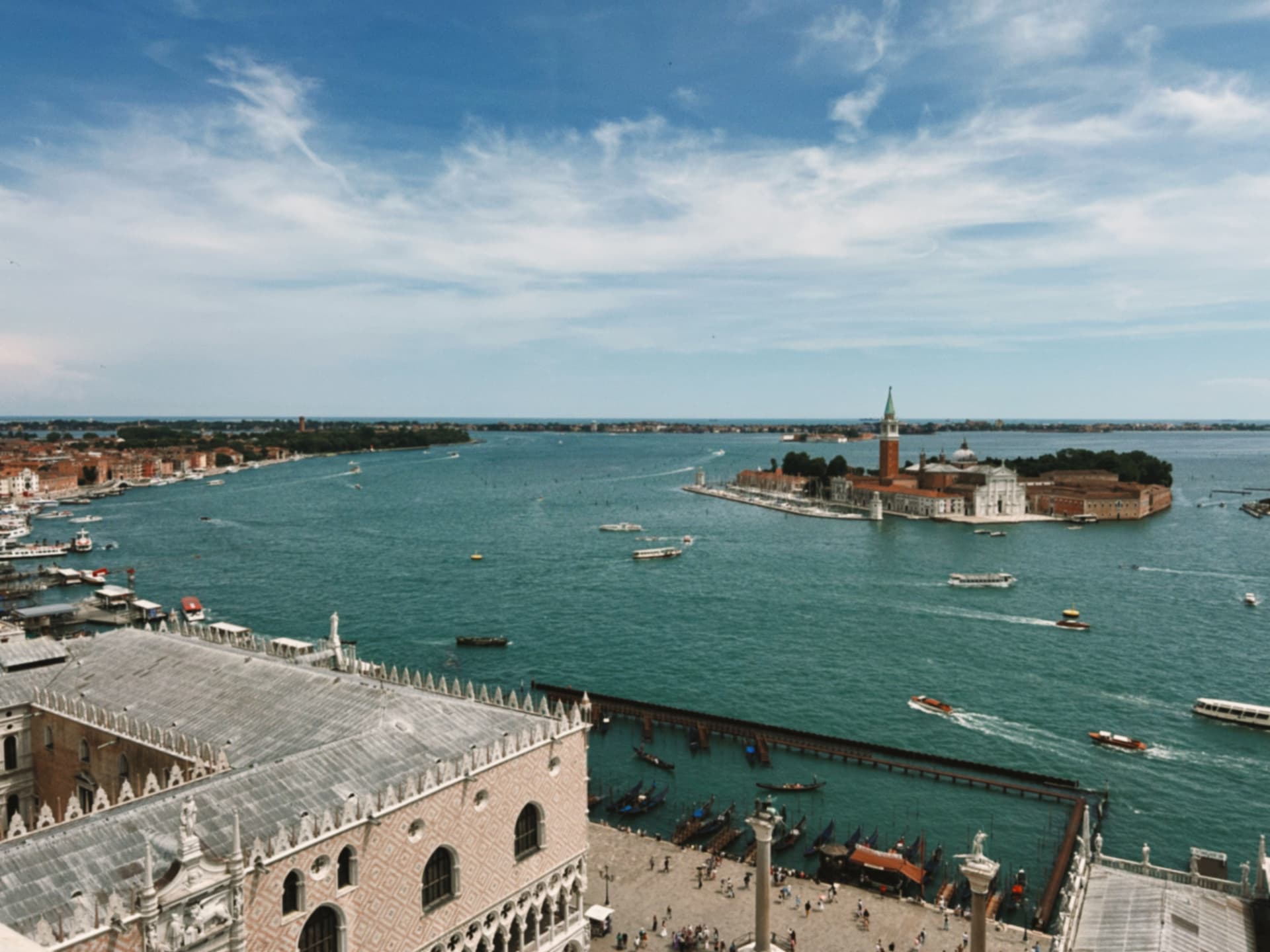 Venice rooftops, the Salute, and moored gondolas