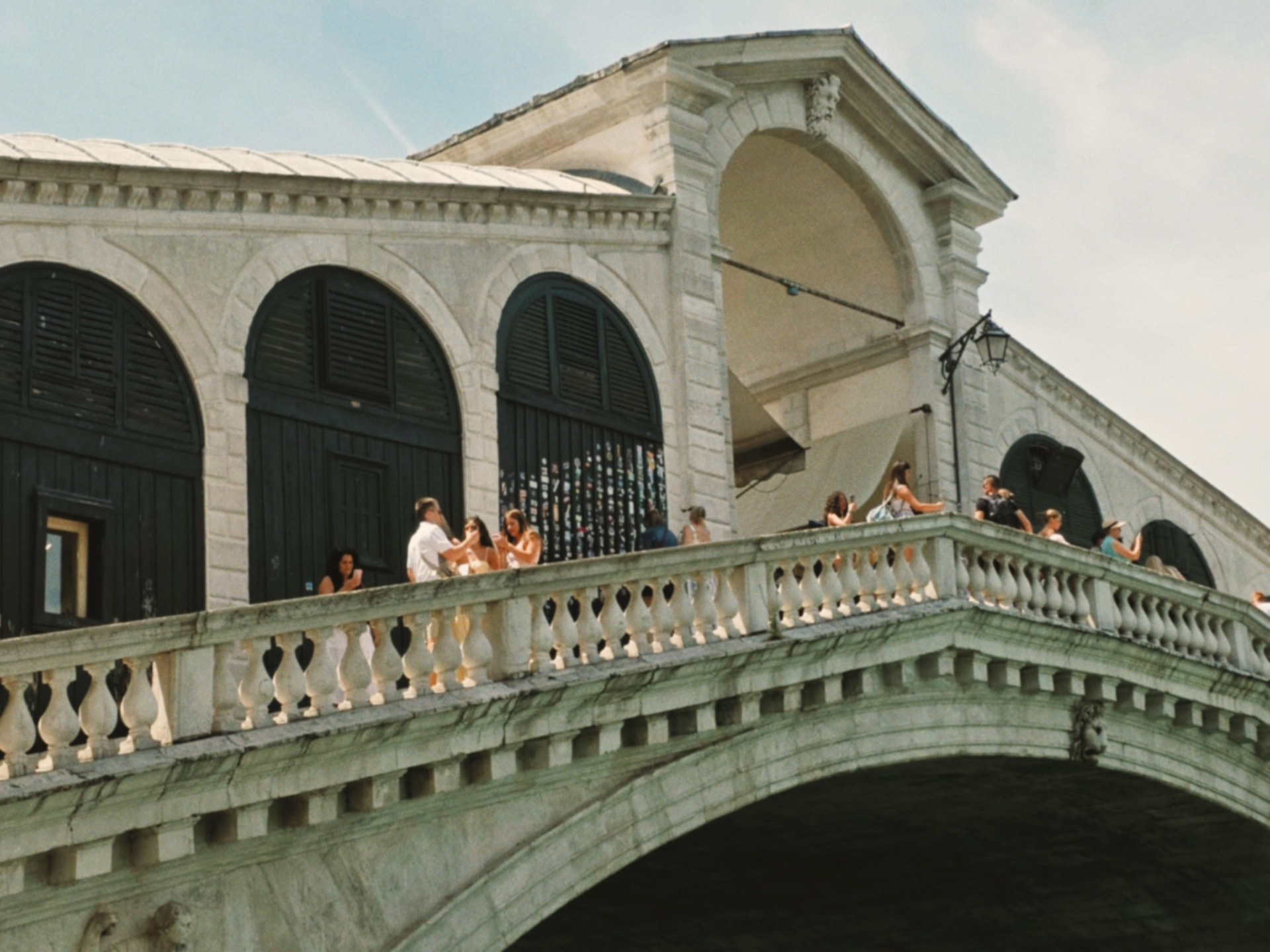 a close view of the Rialto bridge arcade