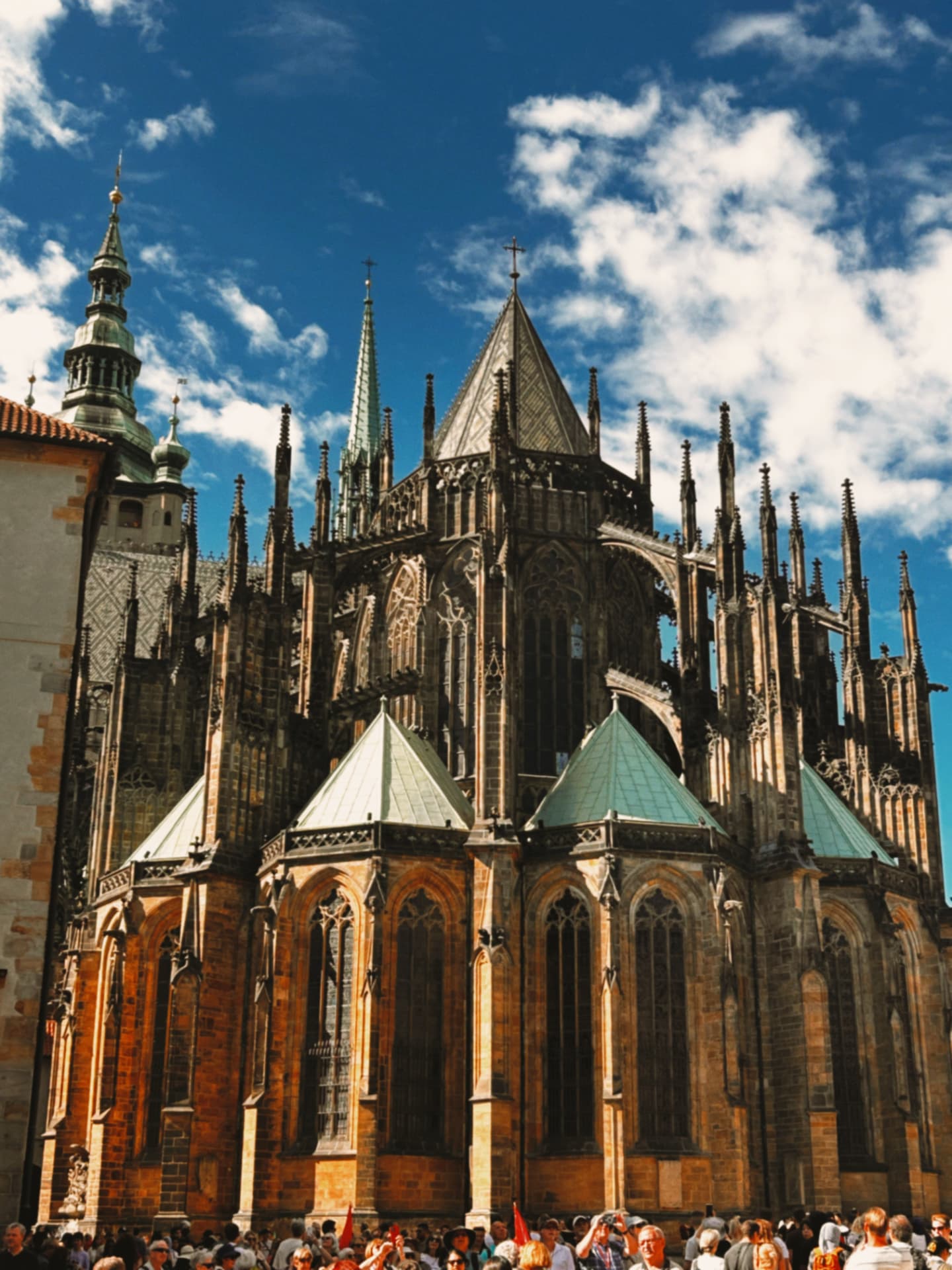 cathedral buttresses and spires against a summer sky