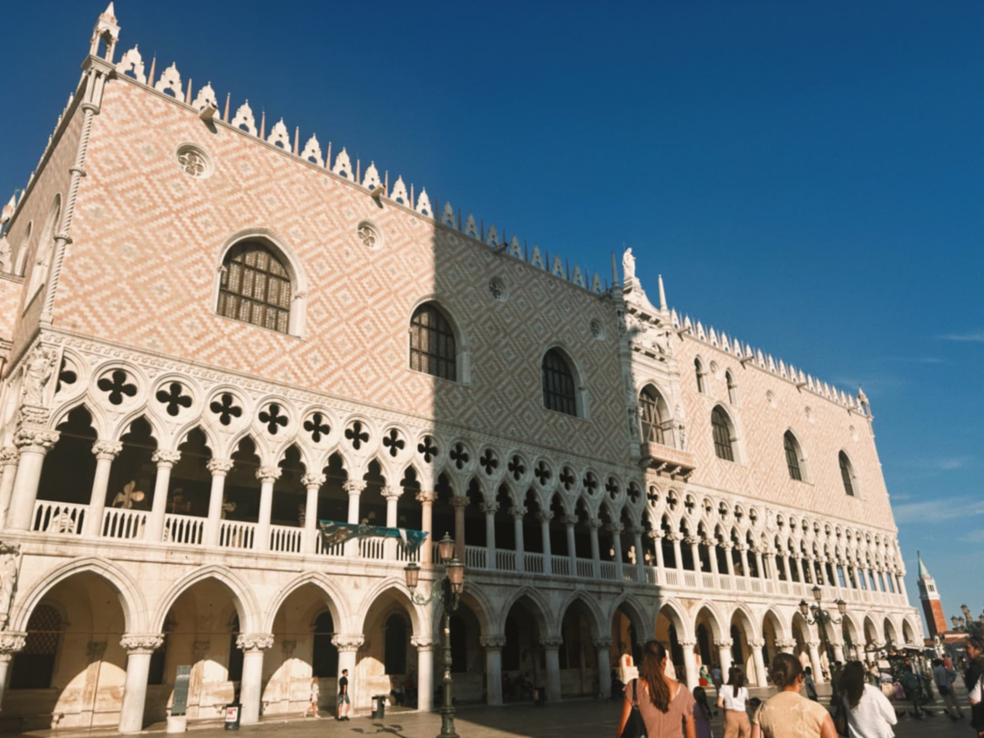 Doge's Palace facade under a blue sky