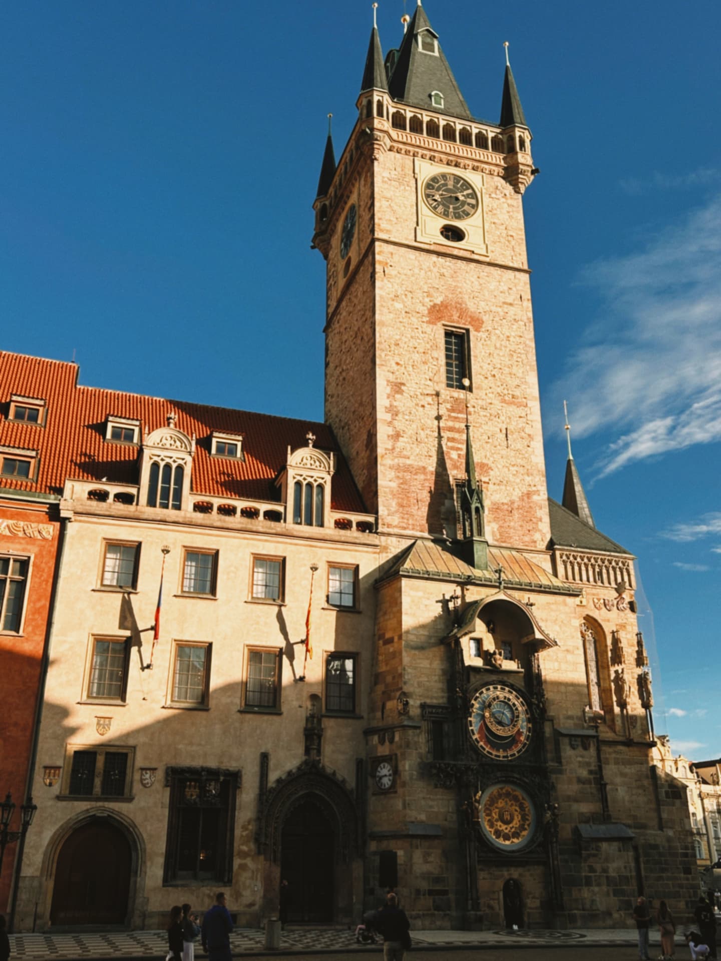 Prague clock tower against a blue sky