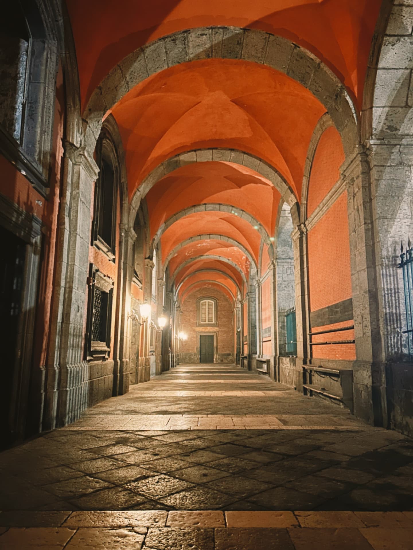 a red-vaulted corridor at night