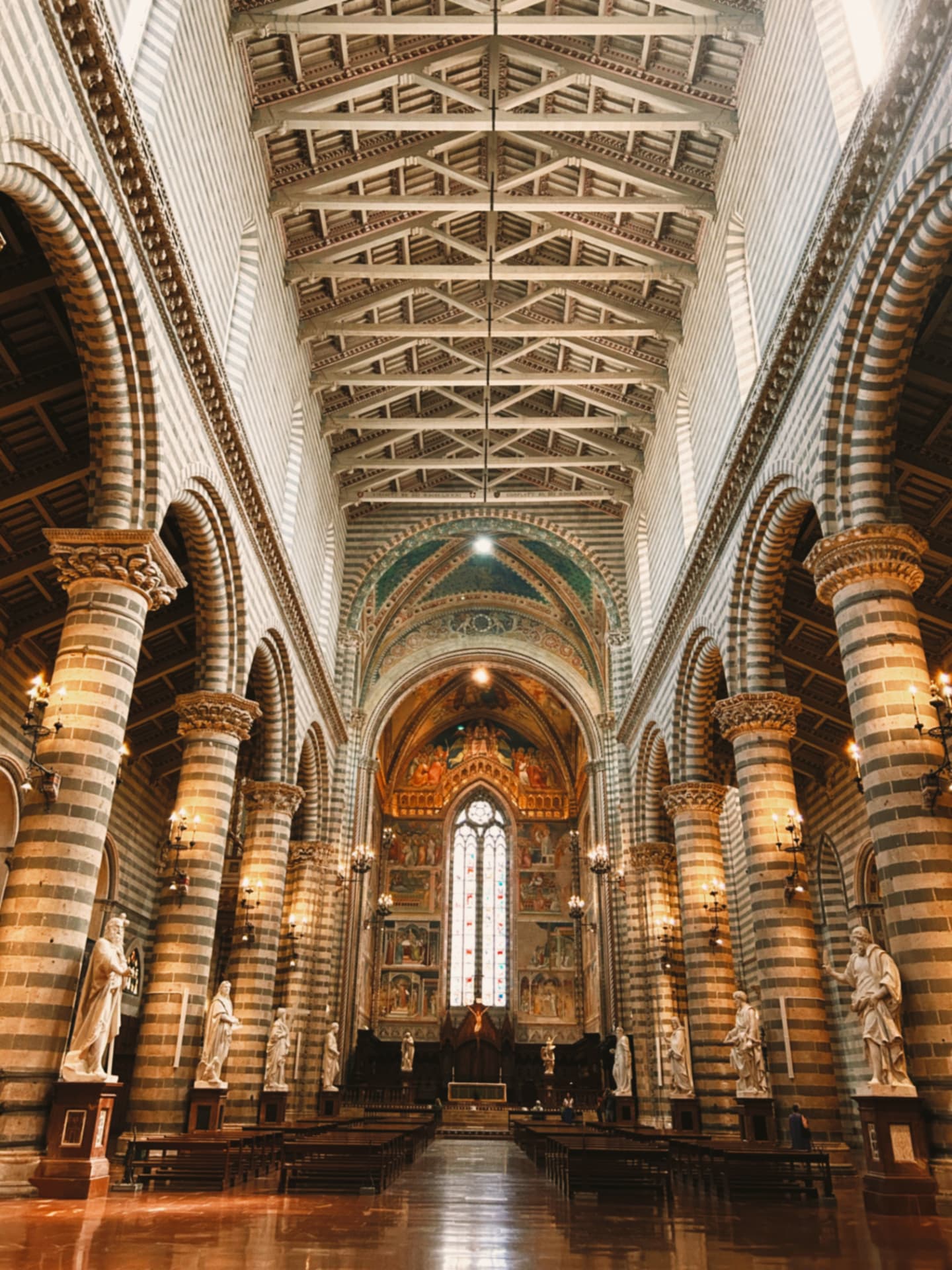 a cathedral interior with striped columns