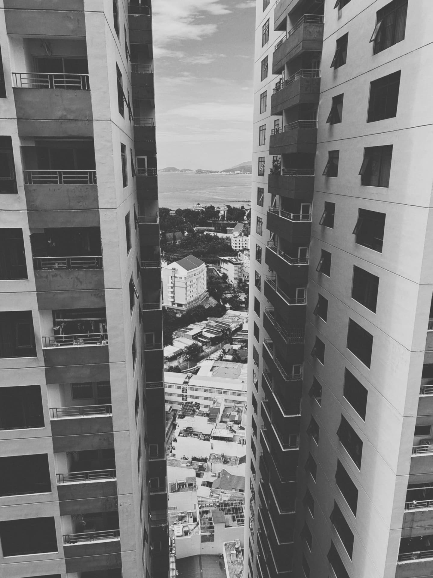 The sea framed in the gap between two towers
